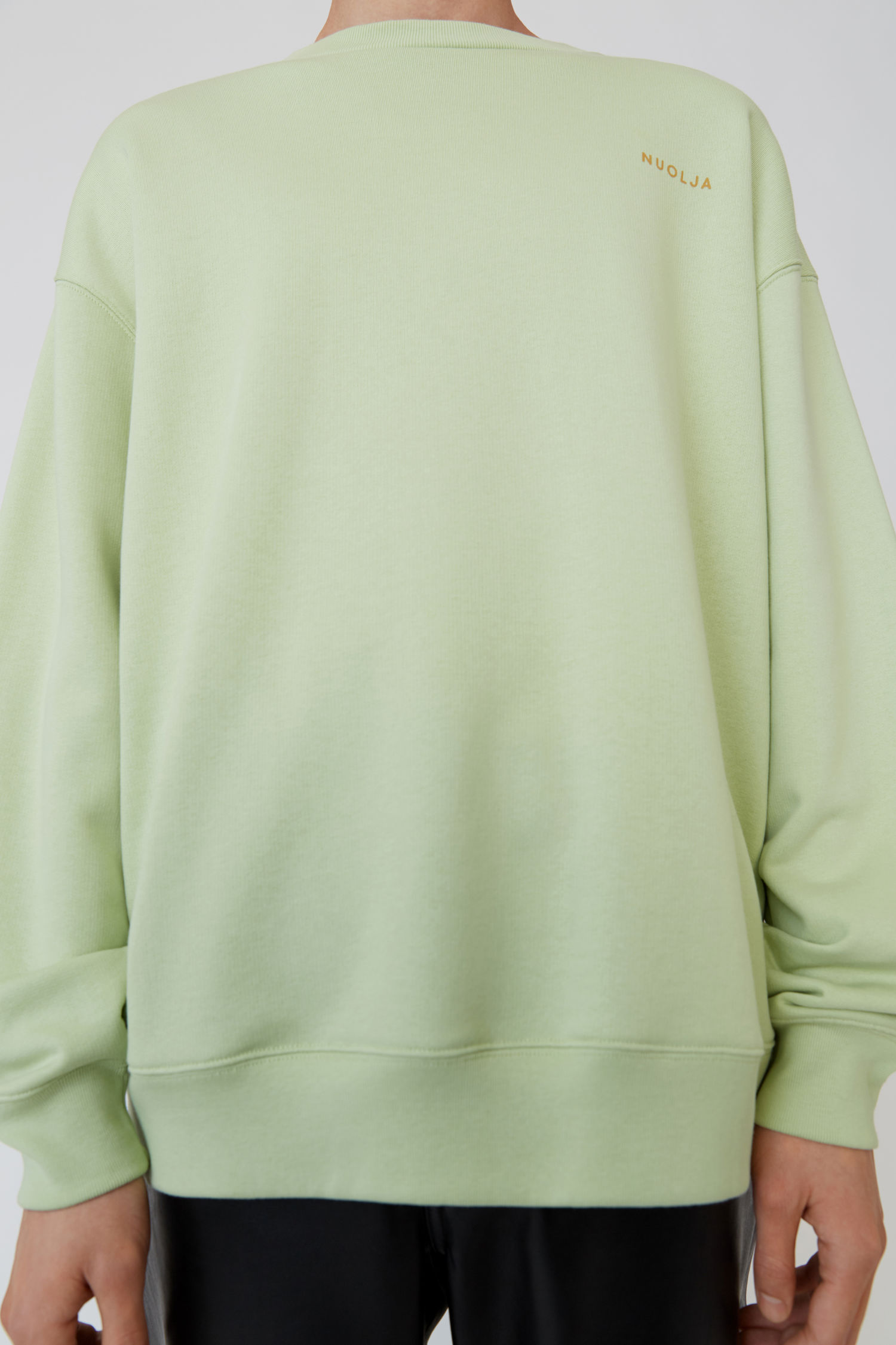 pale green sweatshirt