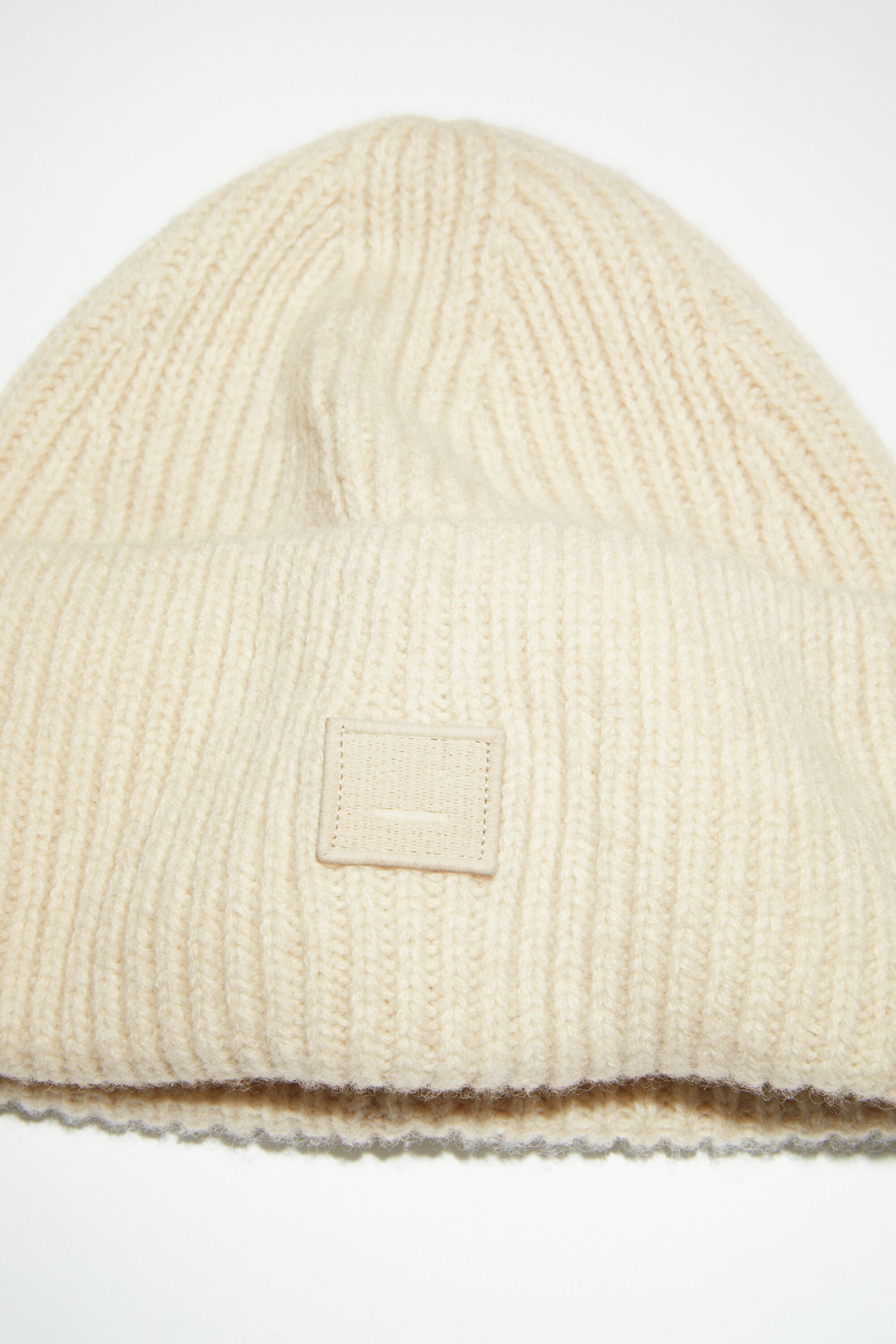 Small face logo beanie