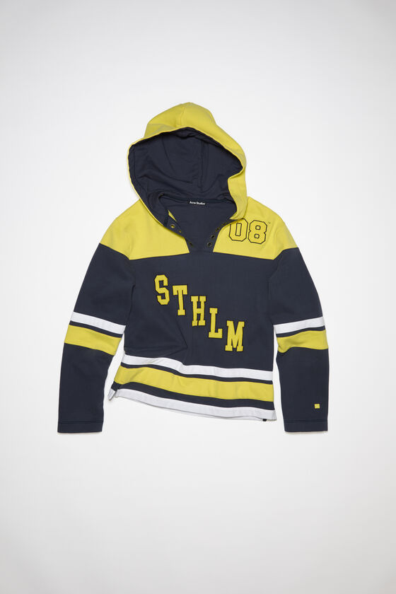 Black, yellow and beige varsity jacket with hoodie front and back