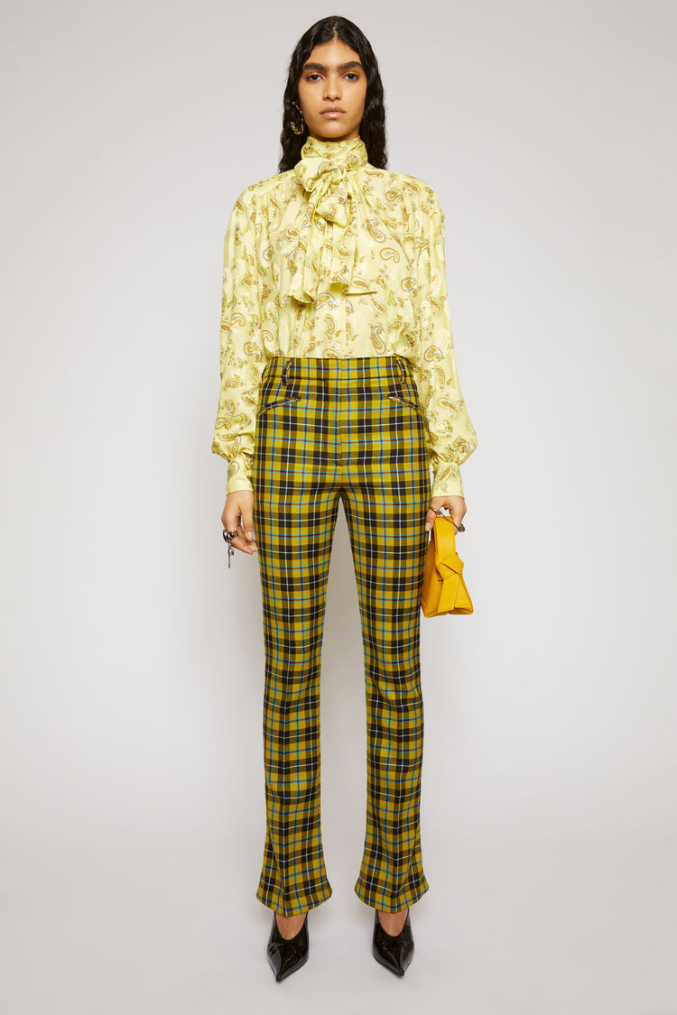 yellow and black checkered trousers